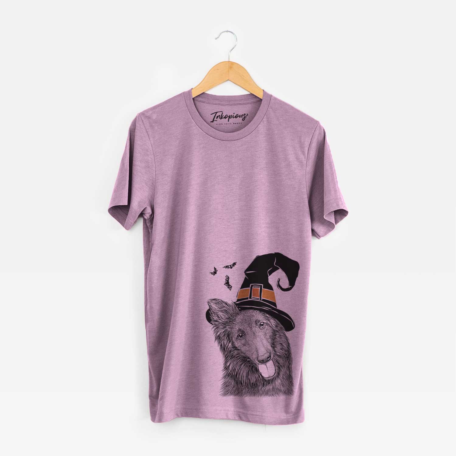 Hand-drawn sketch of Jaxx the Belgian Tervuren wearing a witch hat on an Orchid Unisex crewneck