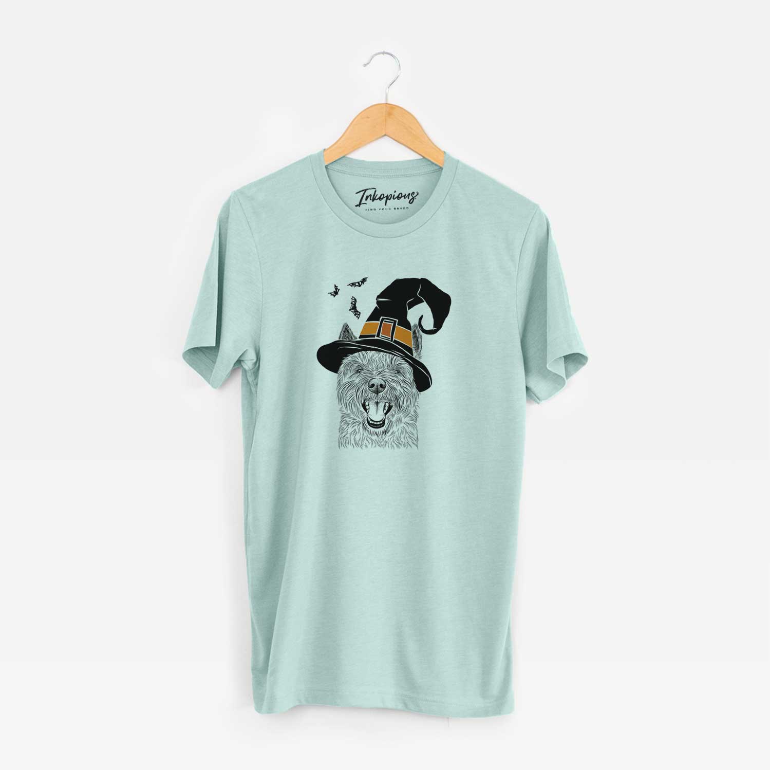 Hand-drawn sketch of Jeff the Cairn Terrier wearing a witch hat on a Heather Sage Unisex crewneck