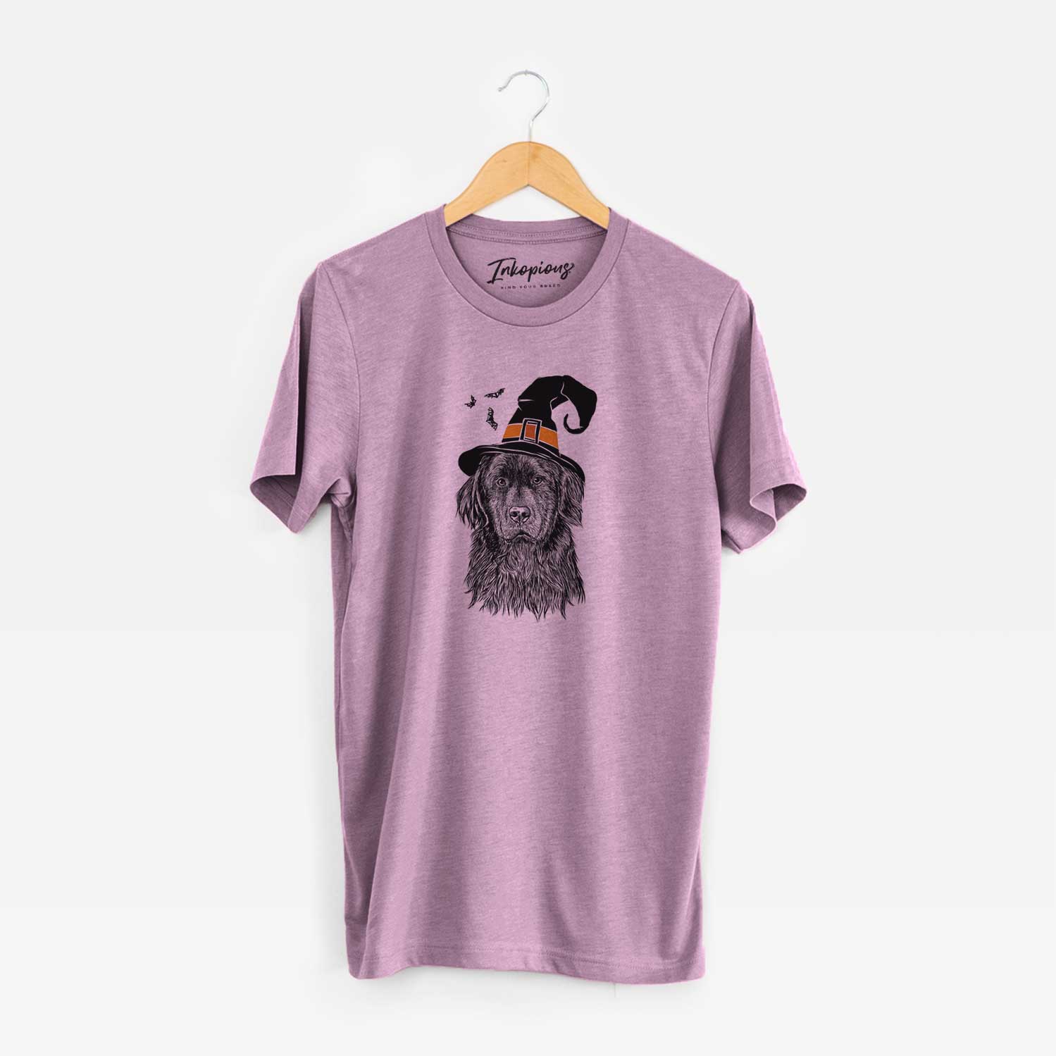 Hand-drawn sketch of Jinx the Newfoundland wearing a witch hat on an Orchid Unisex crewneck