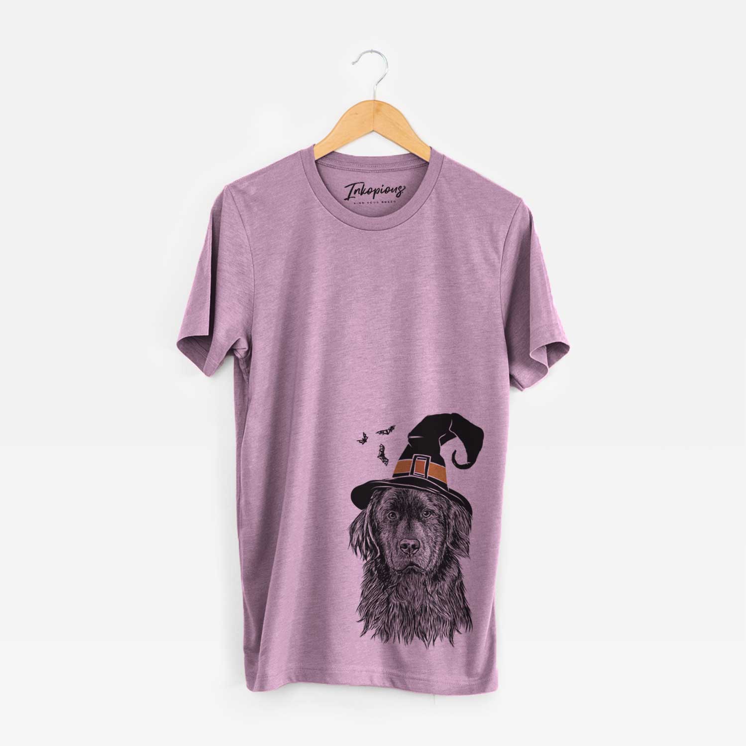 Hand-drawn sketch of Jinx the Newfoundland wearing a witch hat on an Orchid Unisex crewneck