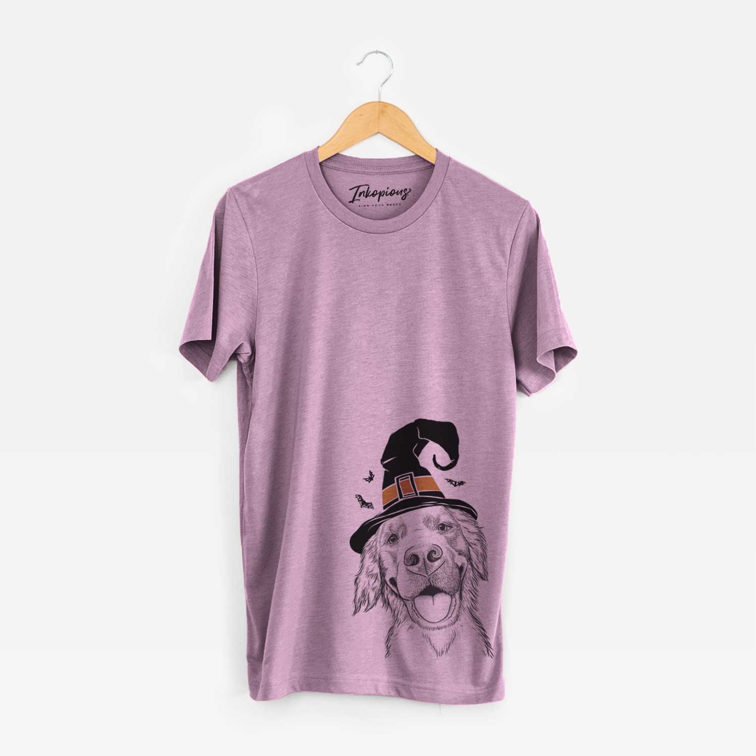 Hand-drawn sketch of Jordy the Golden Retriever wearing a witch hat on an Orchid Unisex crewneck