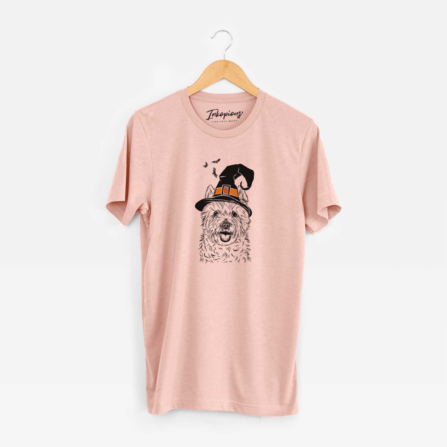 Hand-drawn sketch of Kami the West Highland Terrier wearing a witch hat on a Peach Unisex crewneck