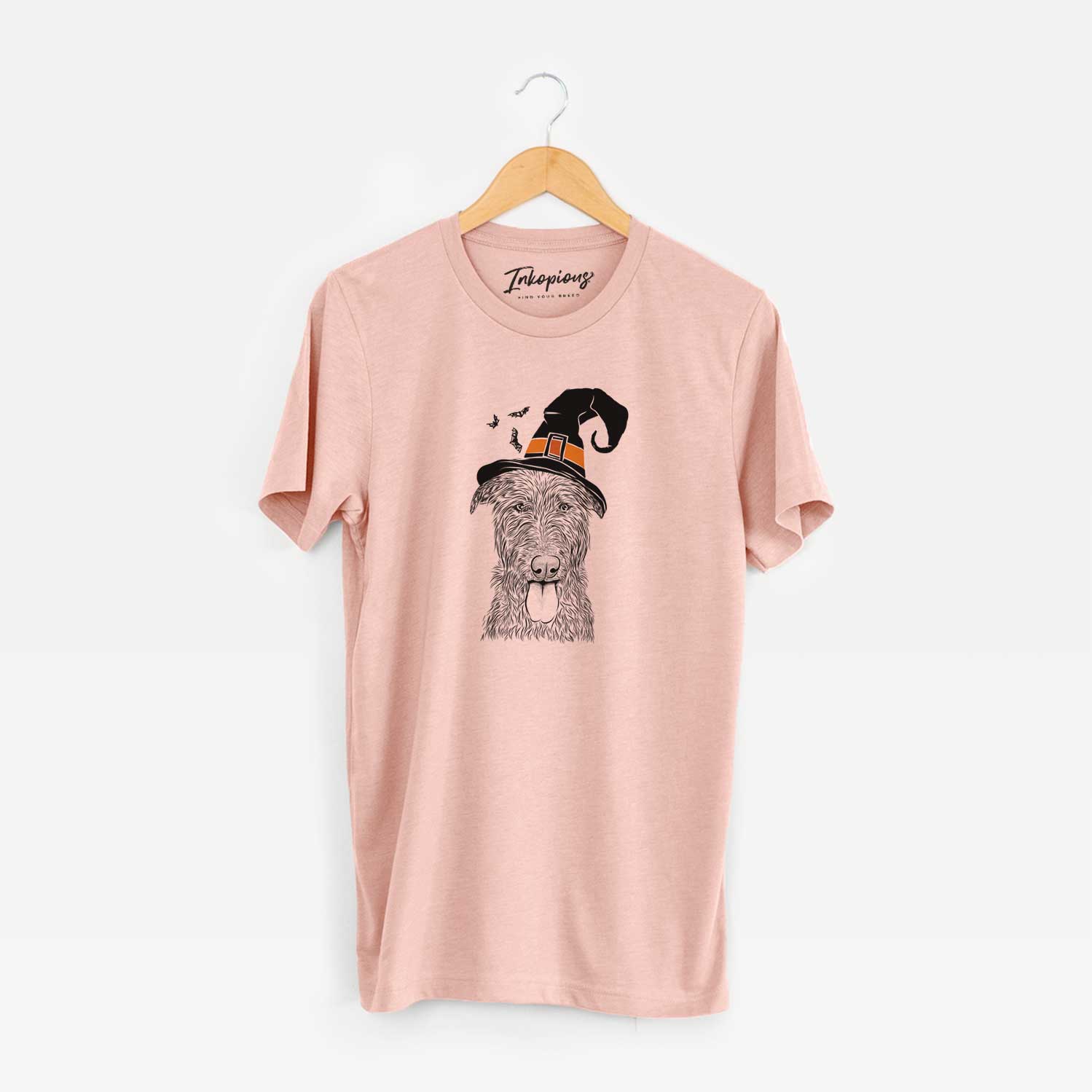 Hand-drawn sketch of Keeva the Irish Wolfhound wearing a witch hat on a Peach Unisex crewneck