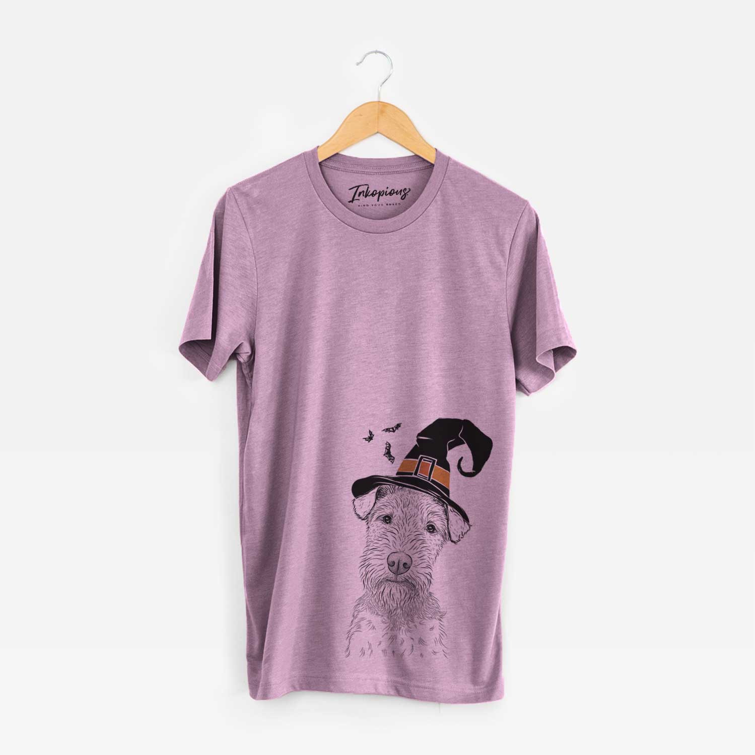 Hand-drawn sketch of Kiara the Welsh Terrier wearing a witch hat on an Orchid Unisex crewneck