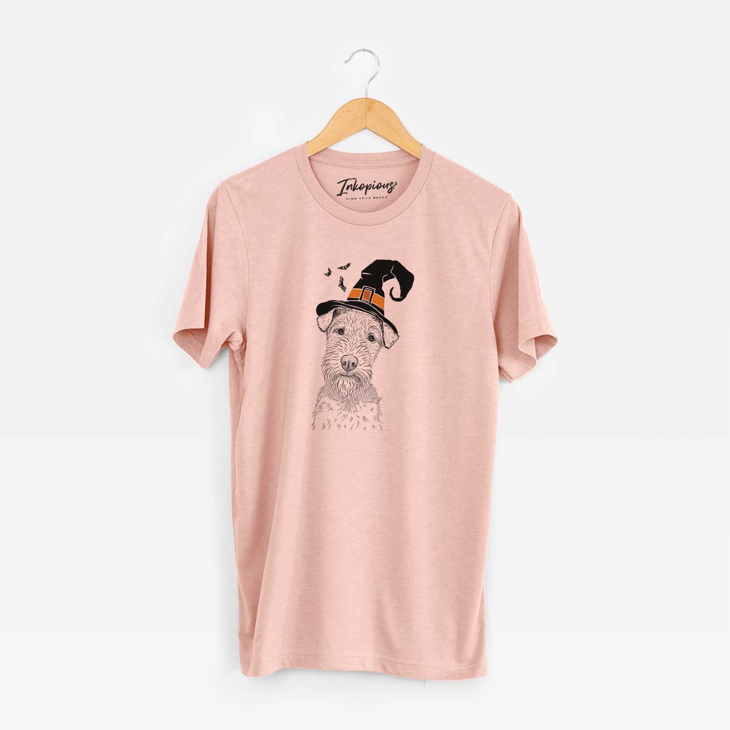 Hand-drawn sketch of Kiara the Welsh Terrier wearing a witch hat on a Peach Unisex crewneck