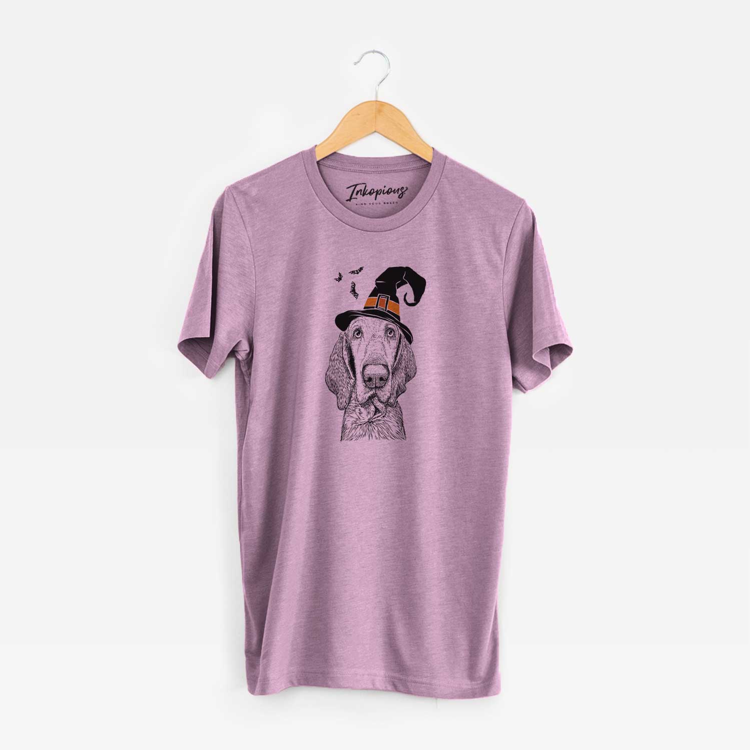 Hand-drawn sketch of Kylie the Bracco Italiano wearing a witch hat on an Orchid Unisex crewneck
