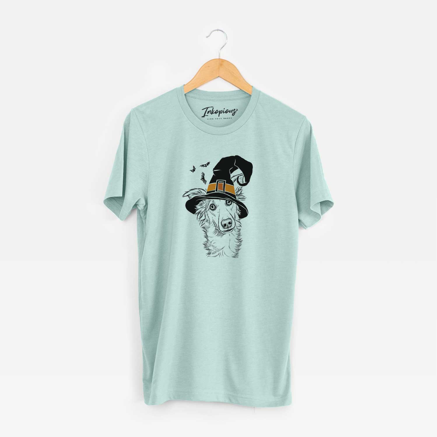 Hand-drawn sketch of Kyu the Windsprite wearing a witch hat on a Heather Sage Unisex crewneck