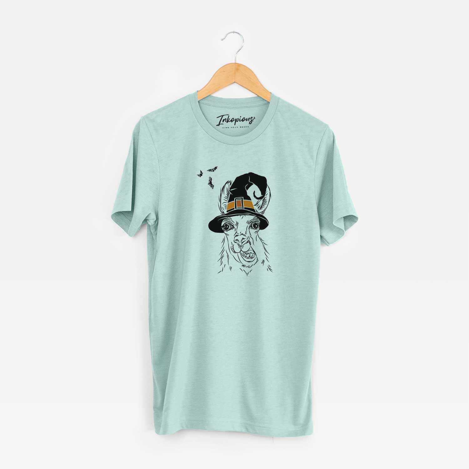 Hand-drawn sketch of Larry the Llama wearing a witch hat on a Heather Sage Unisex crewneck