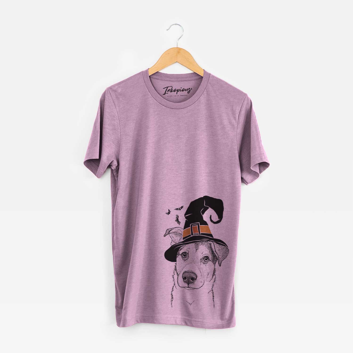 Hand-drawn sketch of Leia the Mixed Breed wearing a witch hat on an Orchid Unisex crewneck