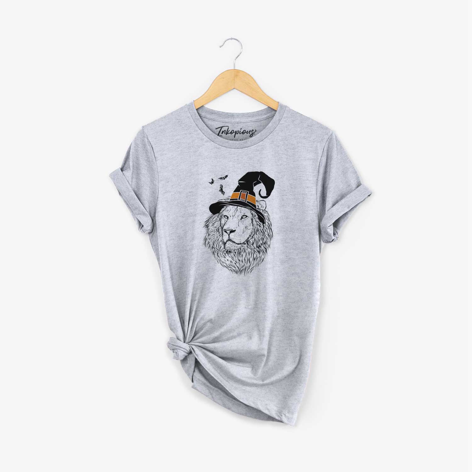 Hand-drawn sketch of Lenny the Lion wearing a witch hat on a Grey Unisex crewneck
