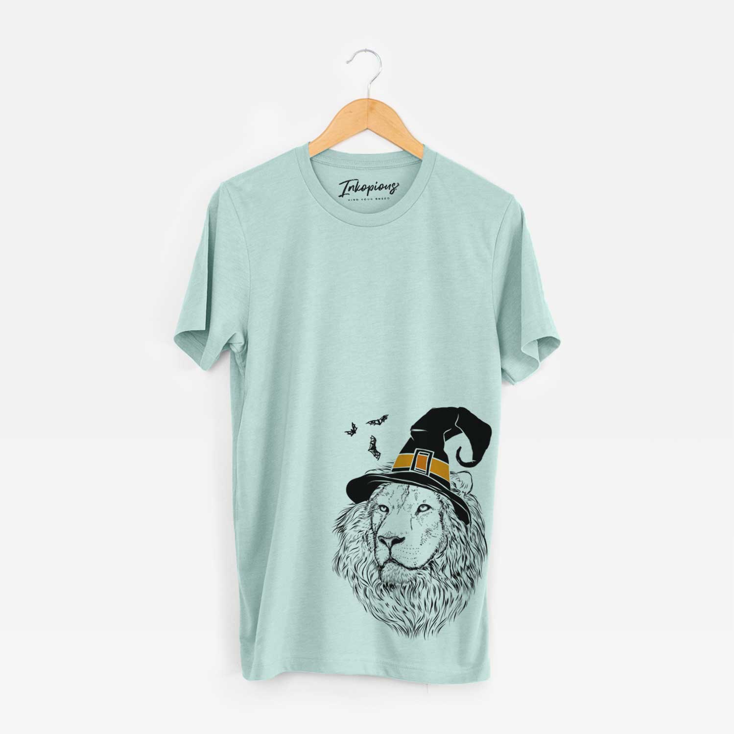 Hand-drawn sketch of Lenny the Lion wearing a witch hat on a Heather Sage Unisex crewneck