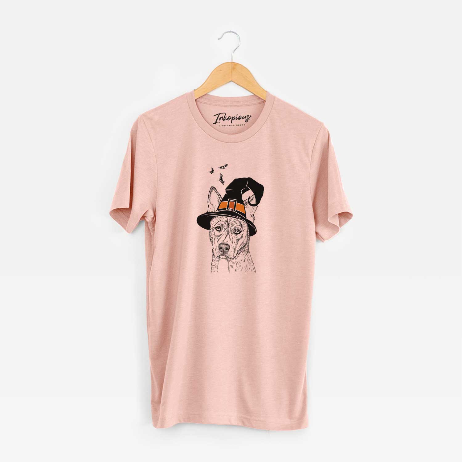 Hand-drawn sketch of Leo the Ibizan Hound Bull Mastiff Mix wearing a witch hat on a Peach Unisex crewneck