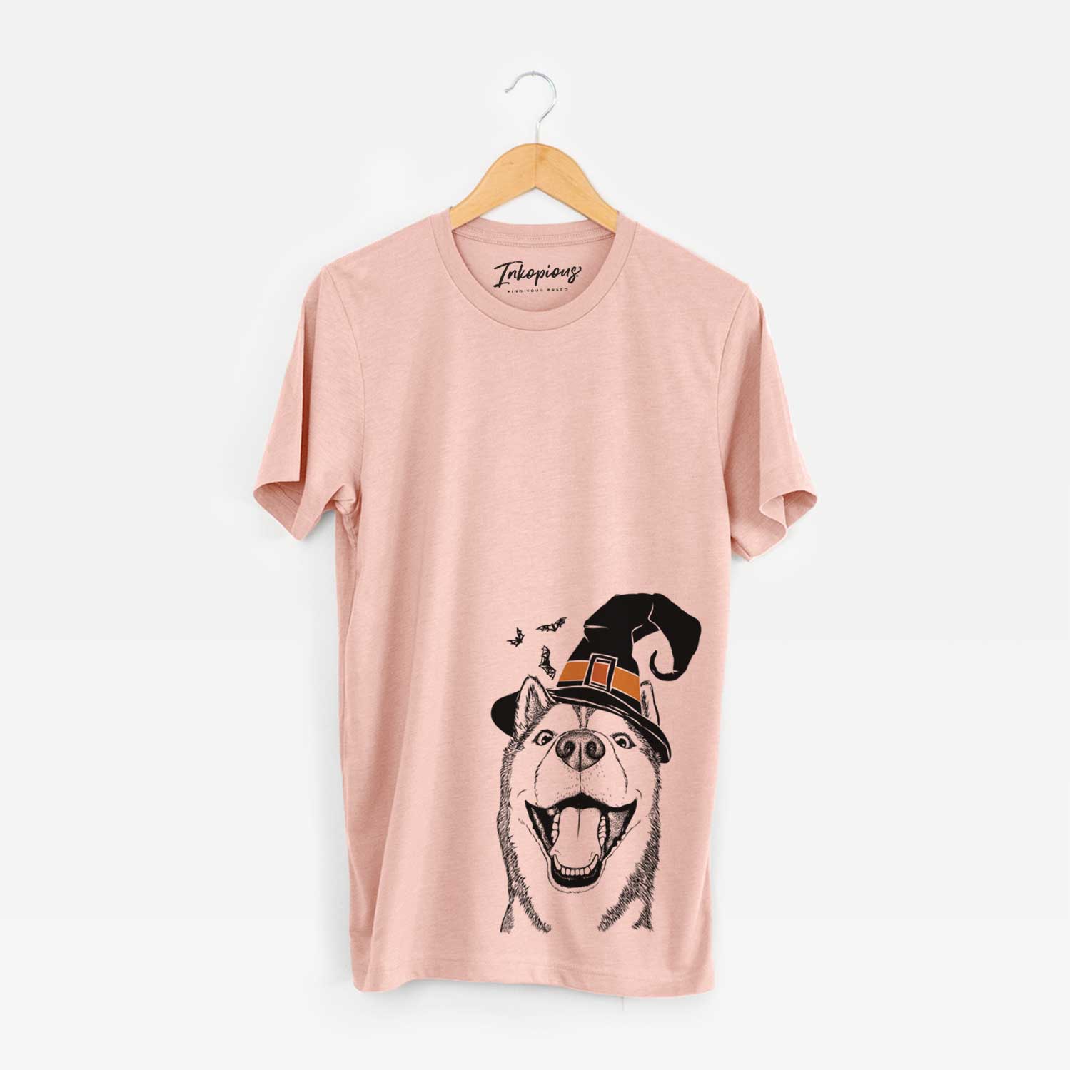 Hand-drawn sketch of Little Country the Siberian Husky wearing a witch hat on a Peach Unisex crewneck