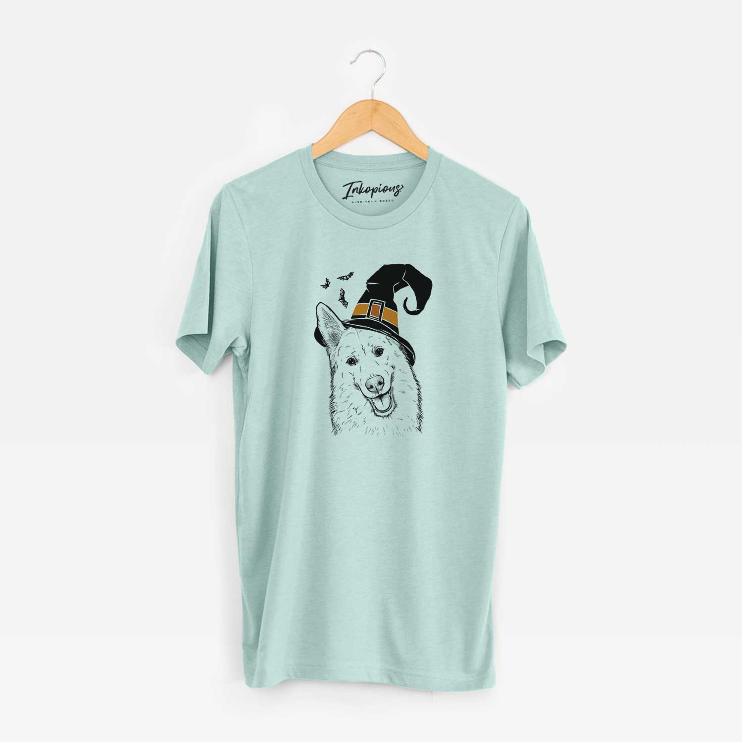 Hand-drawn sketch of Loki the Husky Shepherd Mix wearing a witch hat on a Heather Sage Unisex crewneck