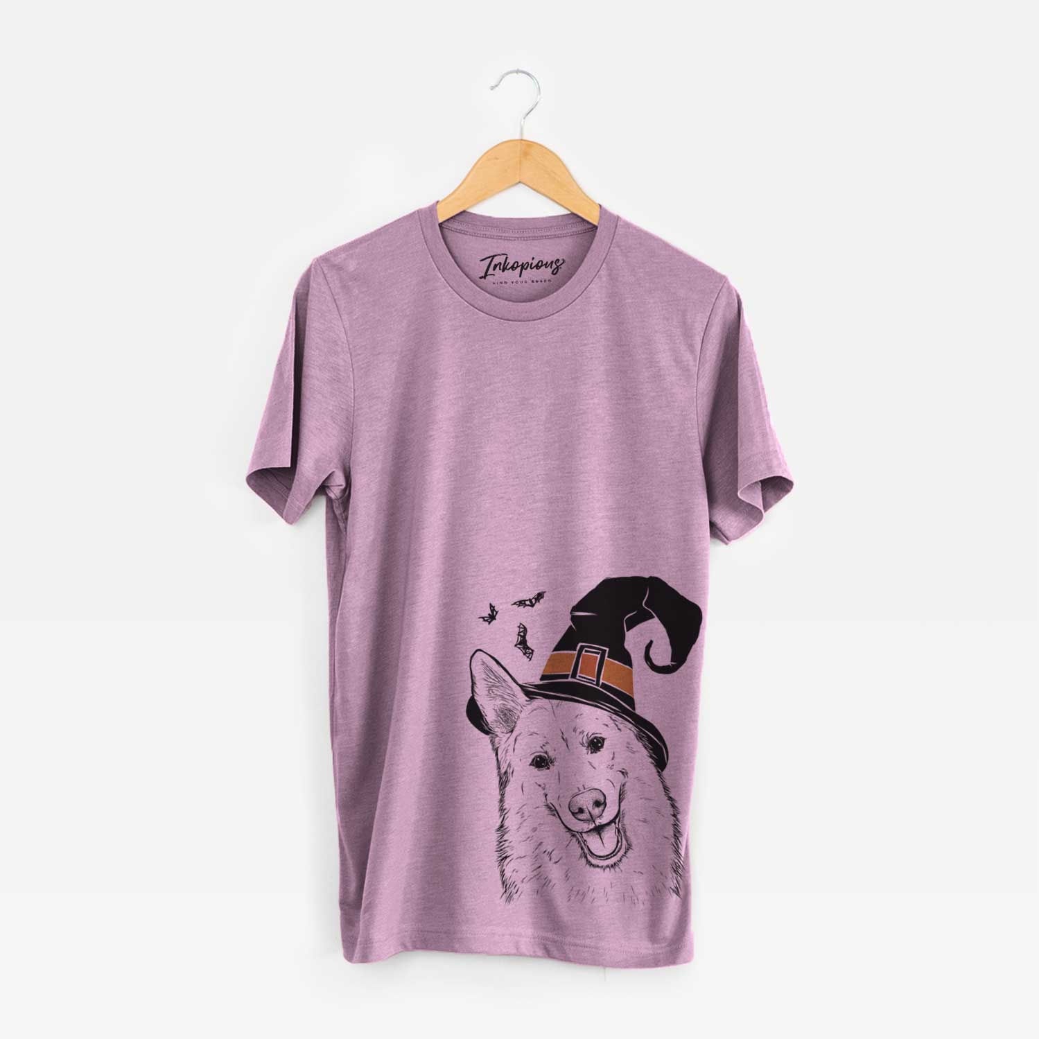 Hand-drawn sketch of Loki the Husky Shepherd Mix wearing a witch hat on an Orchid Unisex crewneck