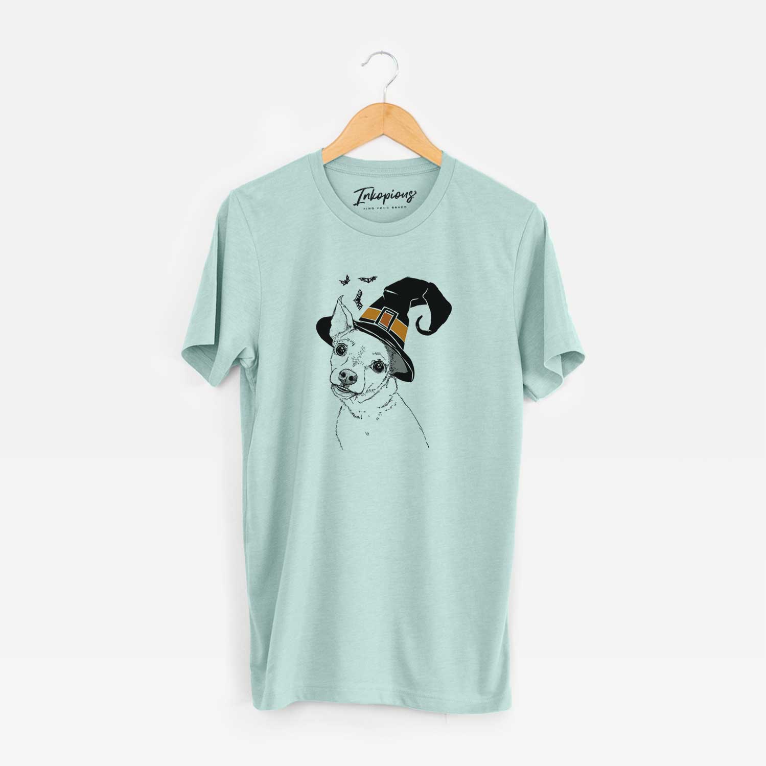 Hand-drawn sketch of Lola the Chiweenie wearing a witch hat on a Heather Sage Unisex crewneck