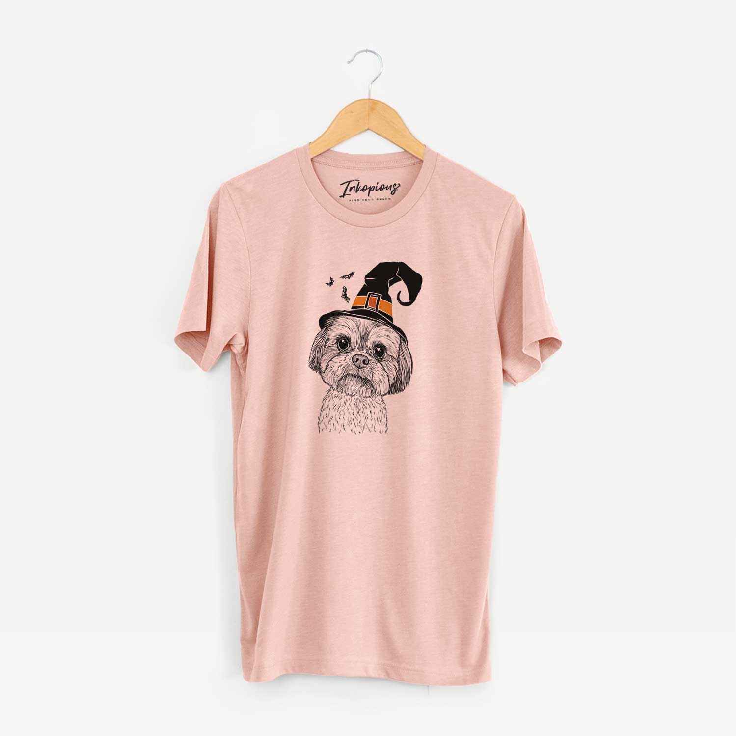 Hand-drawn sketch of Lucy the Shorkie wearing a witch hat on a Peach Unisex crewneck