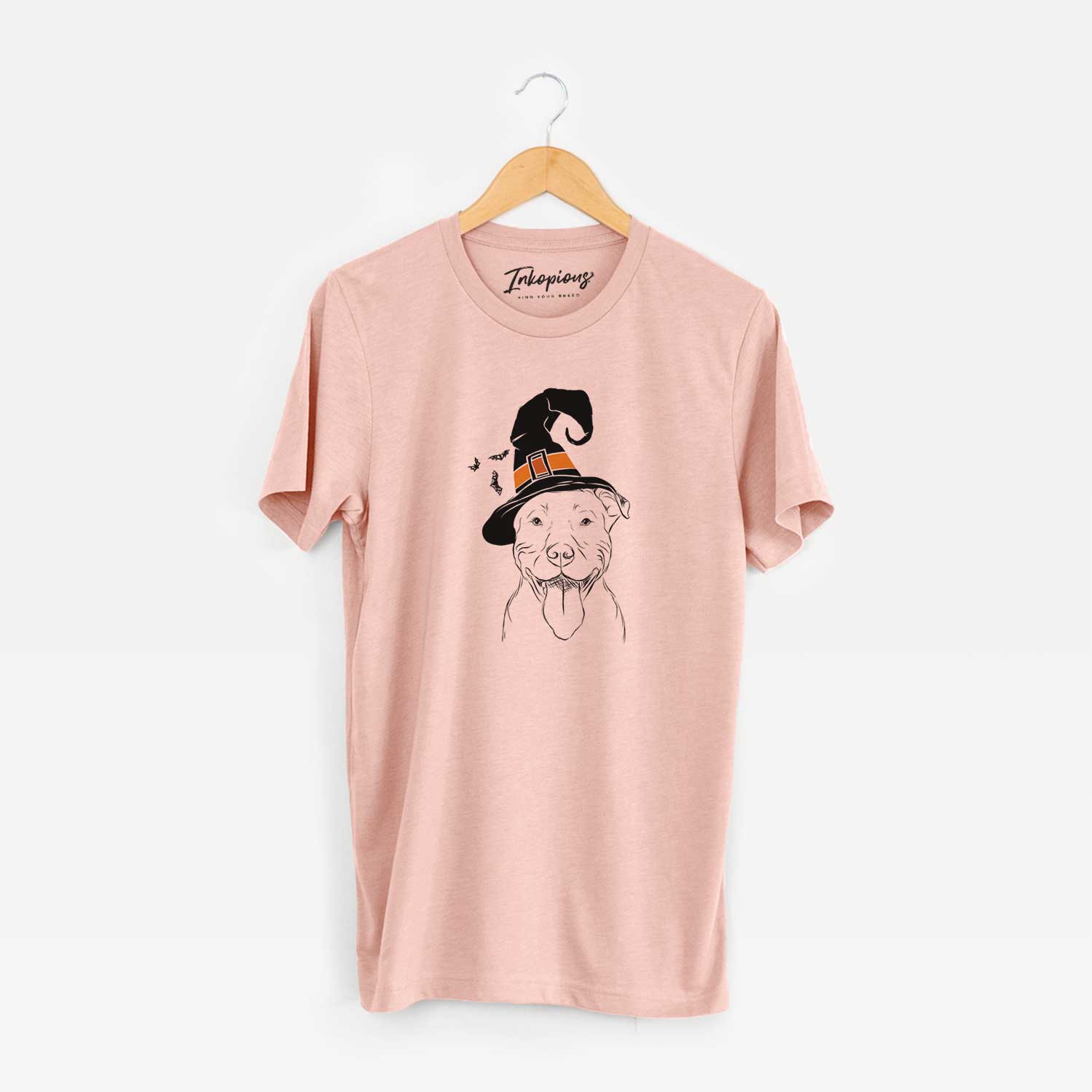 Hand-drawn sketch of Major the Pitbull wearing a witch hat on a Peach Unisex crewneck