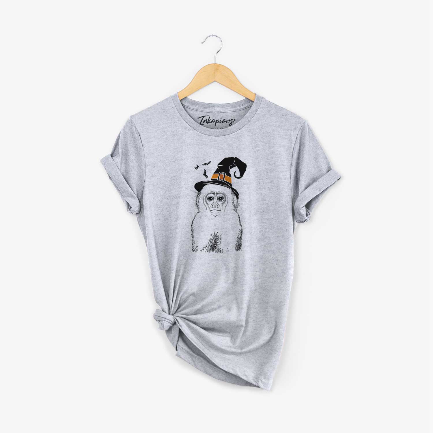 Hand-drawn sketch of Marcel the Capuchin Monkey wearing a witch hat on a Grey Unisex crewneck