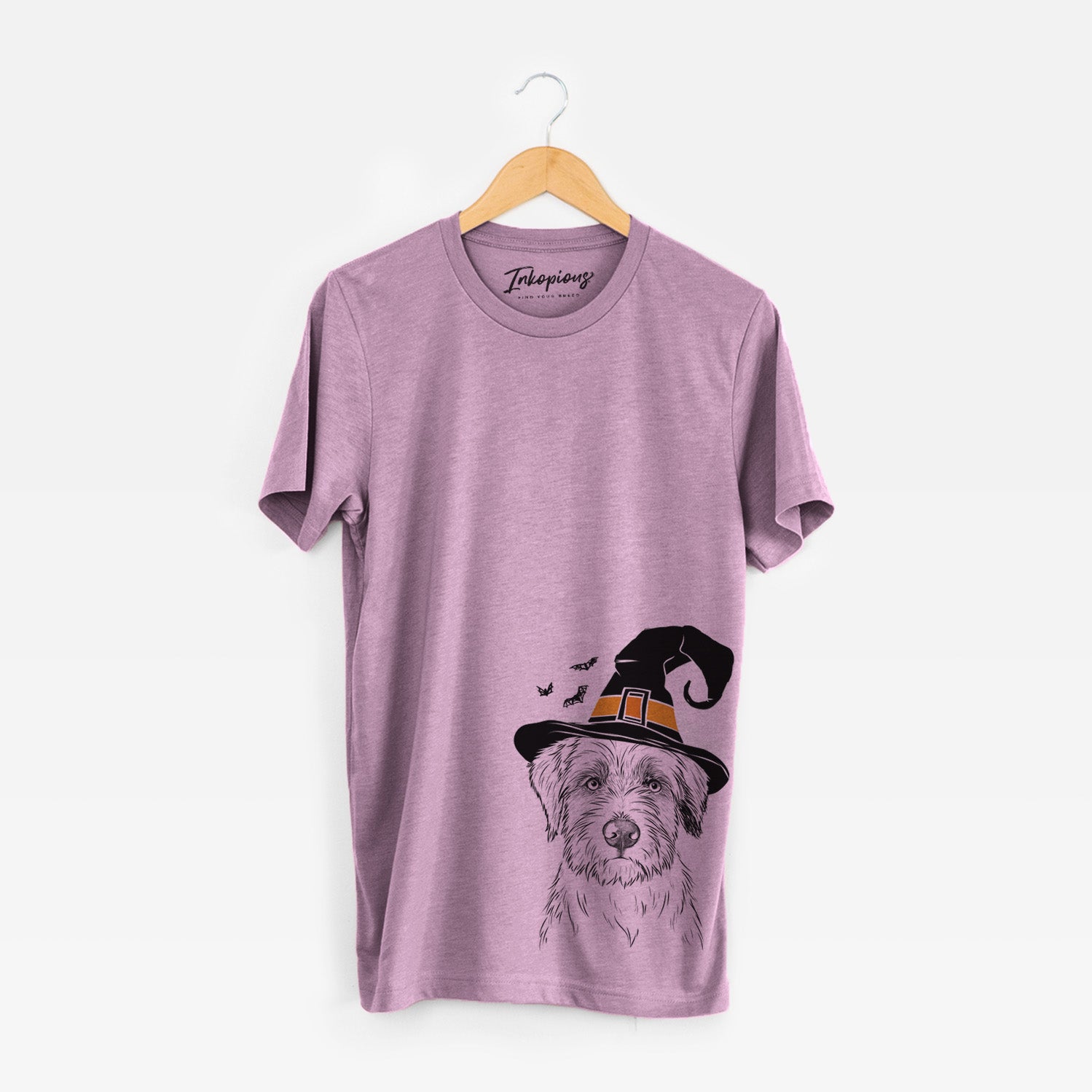Hand-drawn sketch of Marek the Bernedoodle wearing a witch hat on an Orchid Unisex crewneck