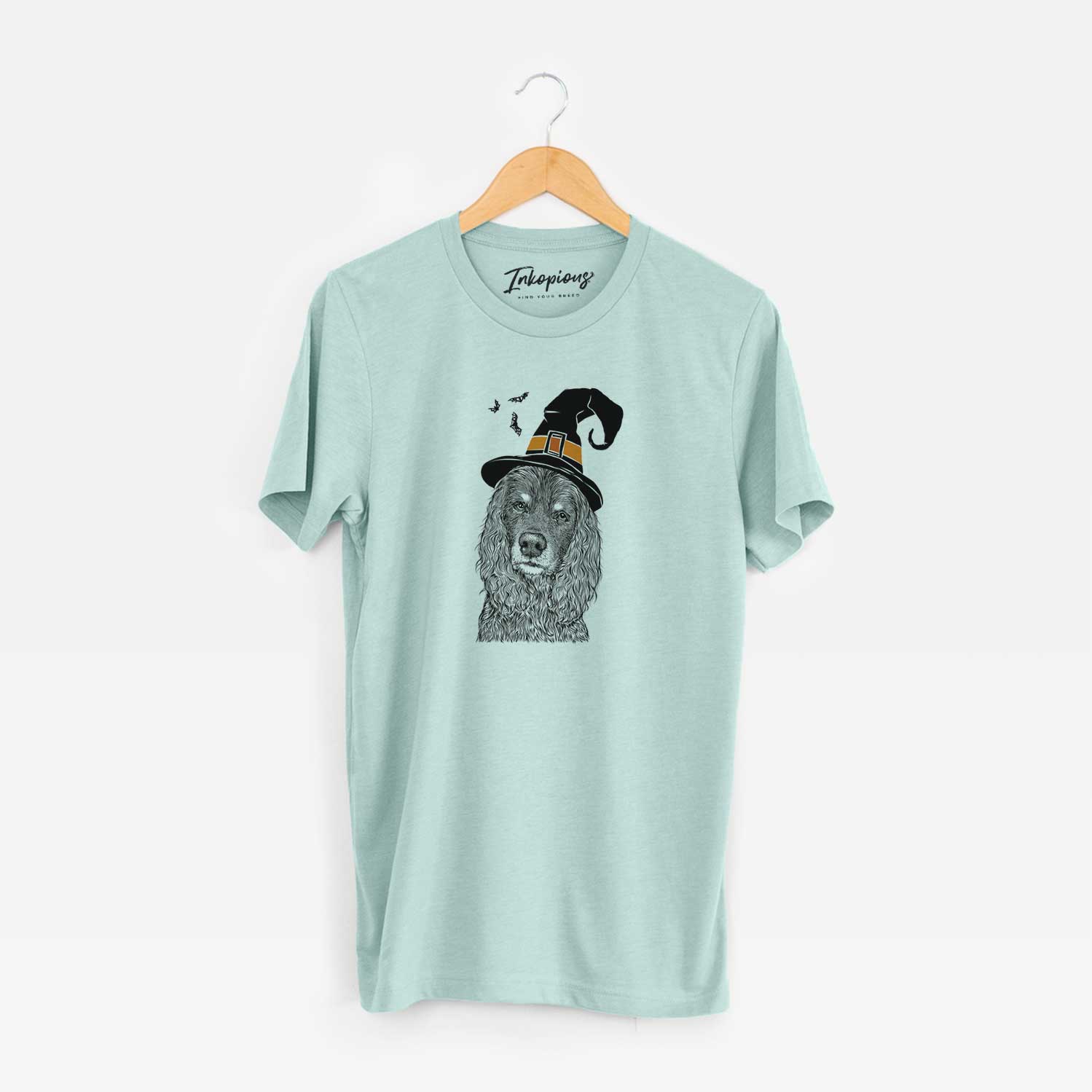 Hand-drawn sketch of Marley Boy the American Cocker Spaniel wearing a witch hat on a Heather Sage Unisex crewneck