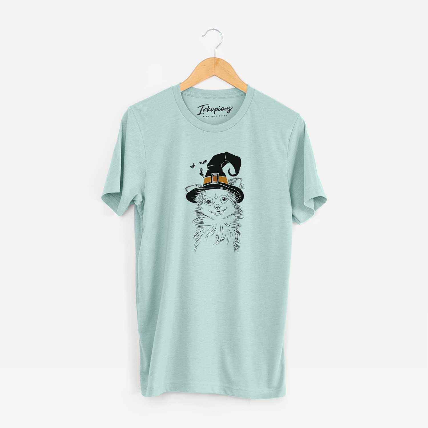 Hand-drawn sketch of Marzi the Long Haired Chihuahua wearing a witch hat on a Heather Sage Unisex crewneck