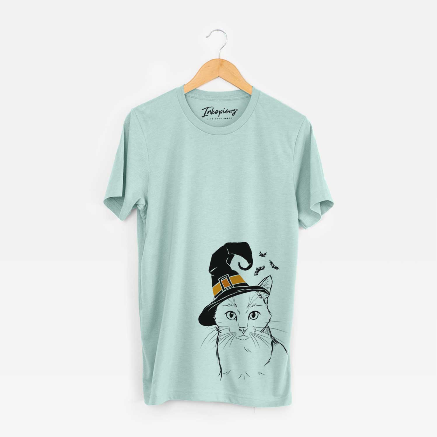 Hand-drawn sketch of Maverick the Cat wearing a witch hat on a Heather Sage Unisex crewneck