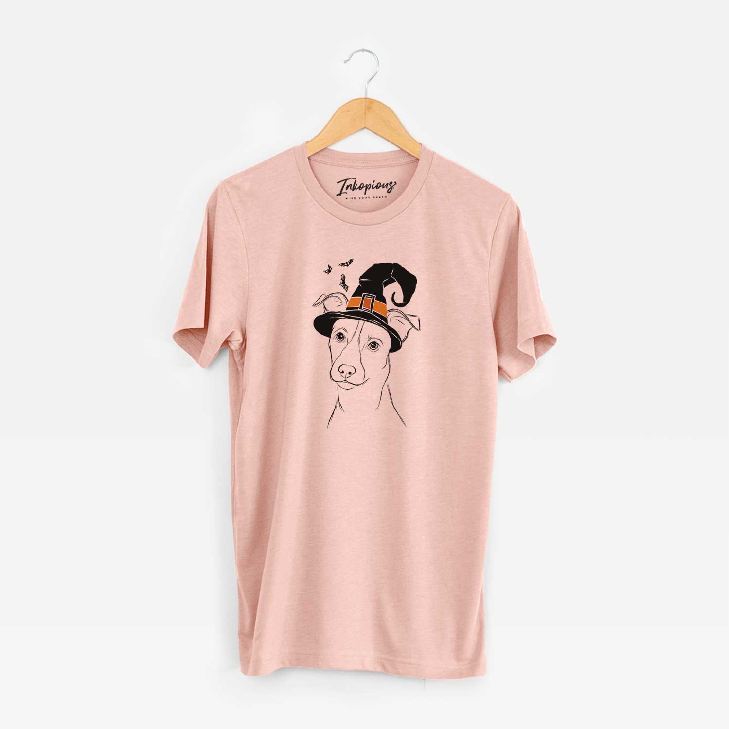 Hand-drawn sketch of Max the Jack Russell Terrier wearing a witch hat on a Peach Unisex crewneck
