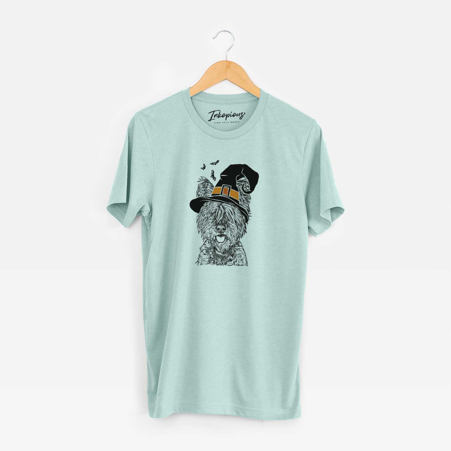Hand-drawn sketch of McDuff the Cairn Terrier wearing a witch hat on a Heather Sage Unisex crewneck
