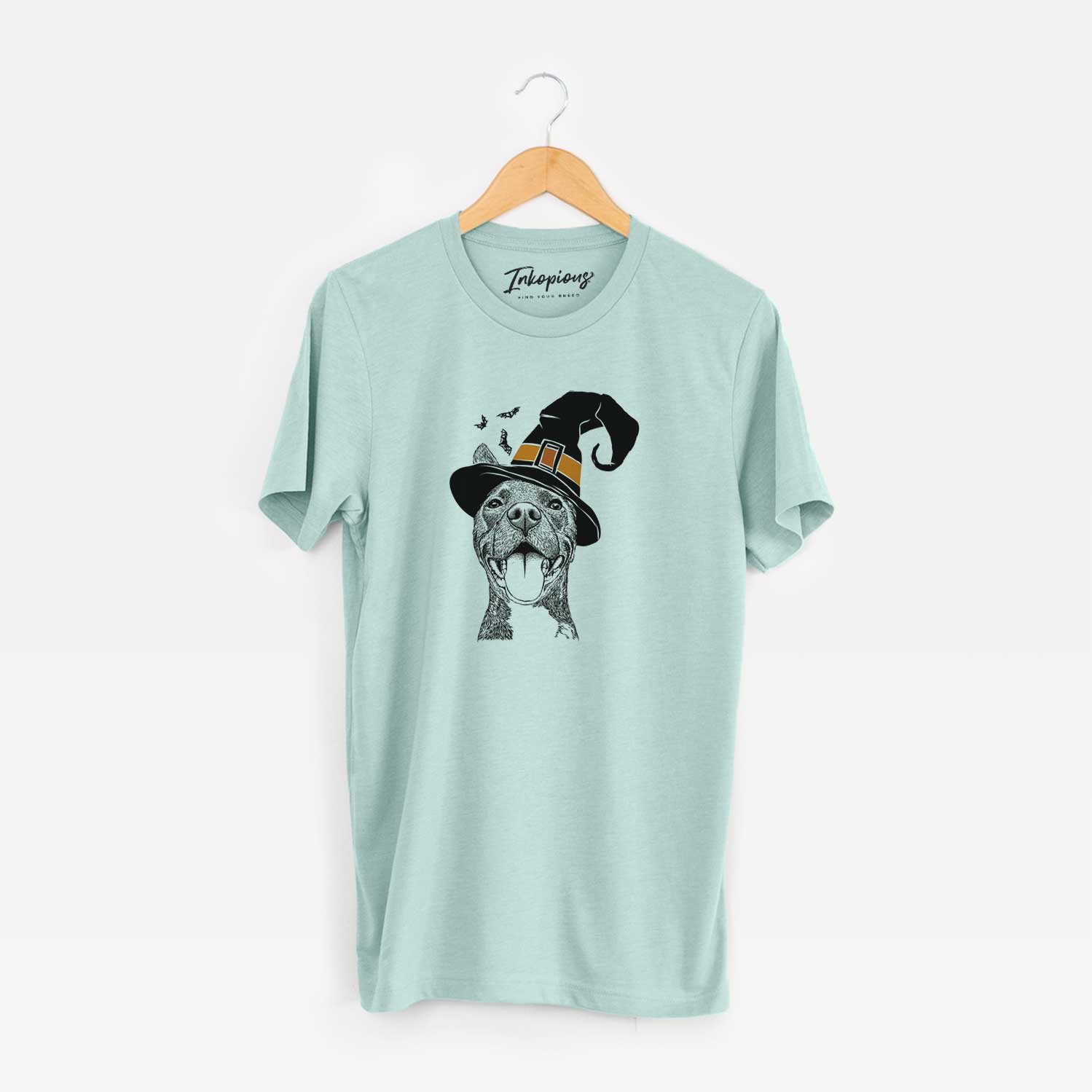 Hand-drawn sketch of Milo the Pitbull Mix wearing a witch hat on a Heather Sage Unisex crewneck