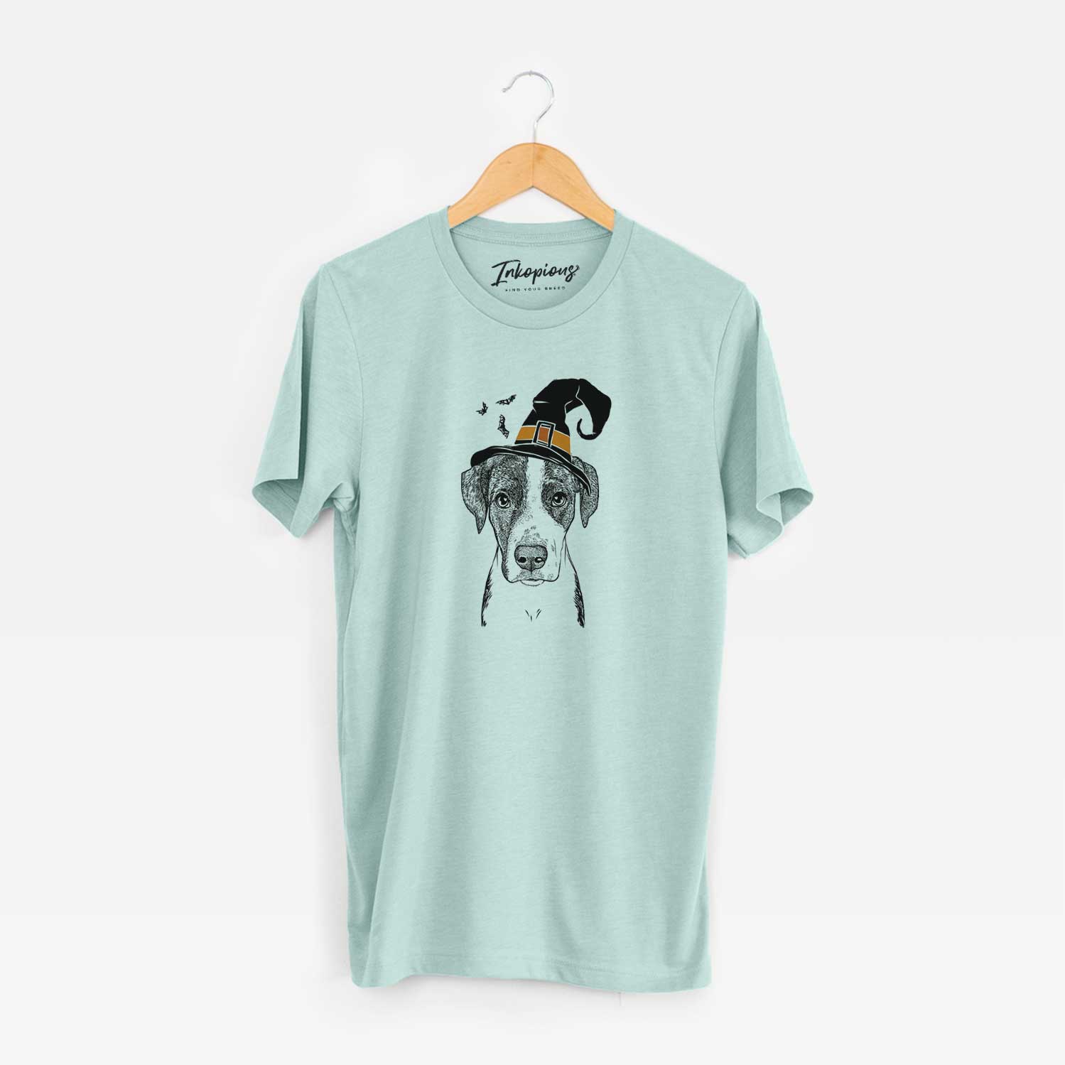 Hand-drawn sketch of Milo the Mixed Breed wearing a witch hat on a Heather Sage Unisex crewneck
