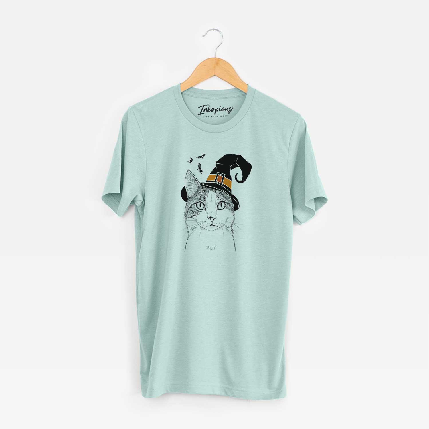 Hand-drawn sketch of Mini Griffin the Domestic Shorthair Cat wearing a witch hat on a Heather Sage Unisex crewneck