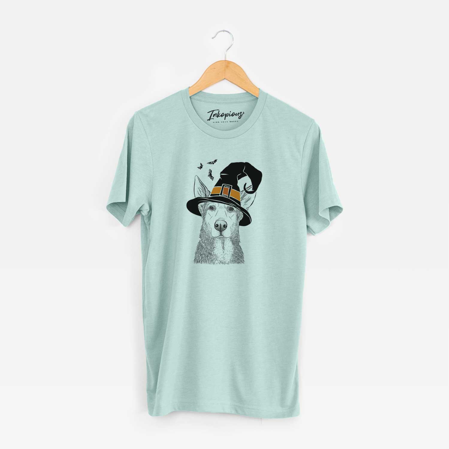 Hand-drawn sketch of Misty the German Shepherd Mix wearing a witch hat on a Heather Sage Unisex crewneck