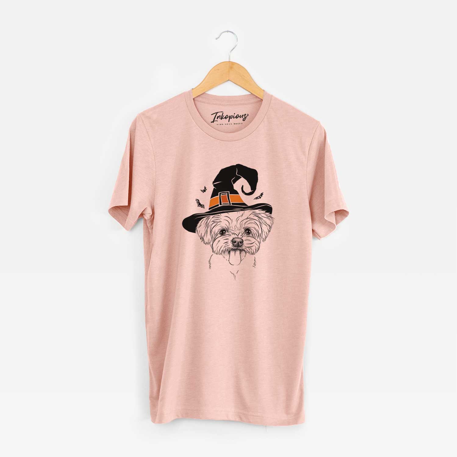 Hand-drawn sketch of Mochi the Maltese wearing a witch hat on a Peach Unisex crewneck