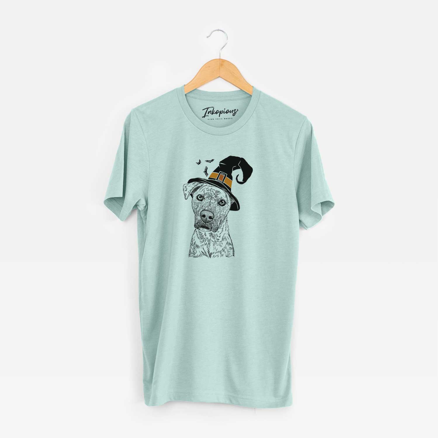 Hand-drawn sketch of Monster Baby the Pitbull Mix wearing a witch hat on a Heather Sage Unisex crewneck