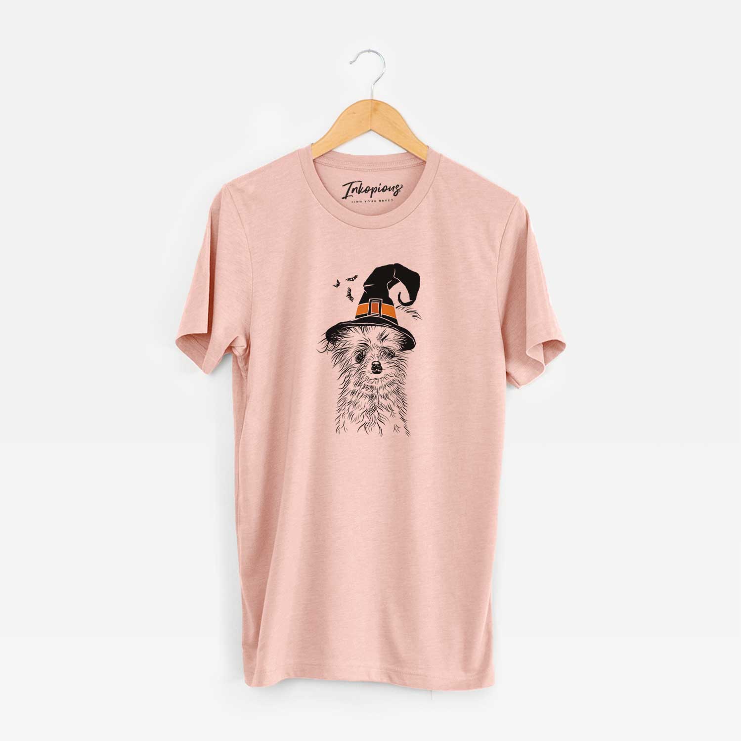 Hand-drawn sketch of Mr. Gucci Poochi the Maltese wearing a witch hat on a Peach Unisex crewneck
