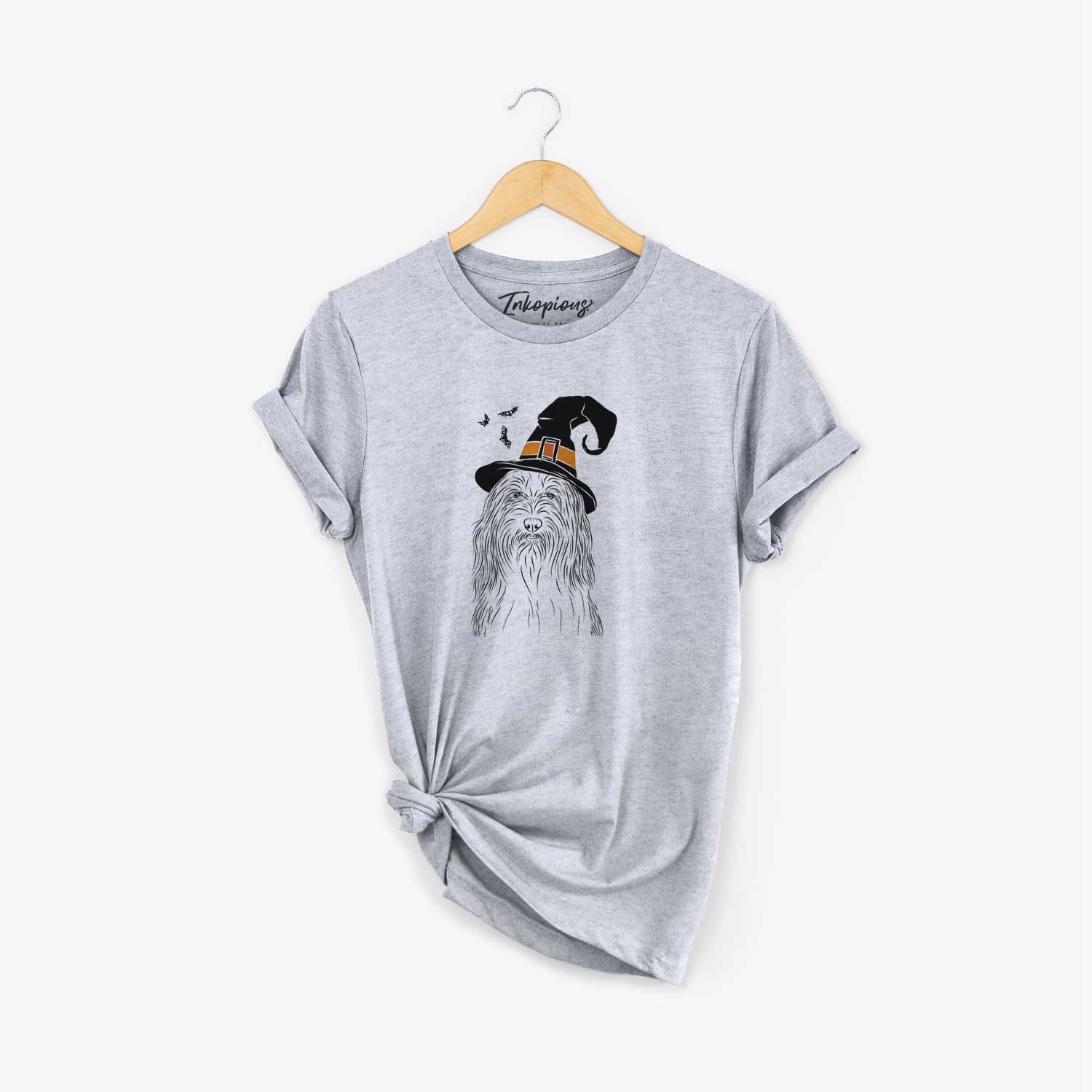 Hand-drawn sketch of Murray the Bearded Collie wearing a witch hat on a Grey Unisex crewneck
