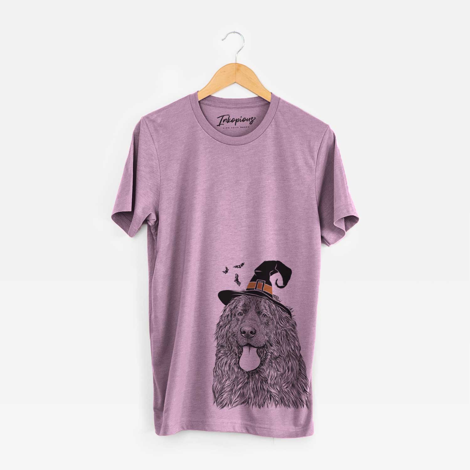 Hand-drawn sketch of Neptune the Newfoundland wearing a witch hat on an Orchid Unisex crewneck