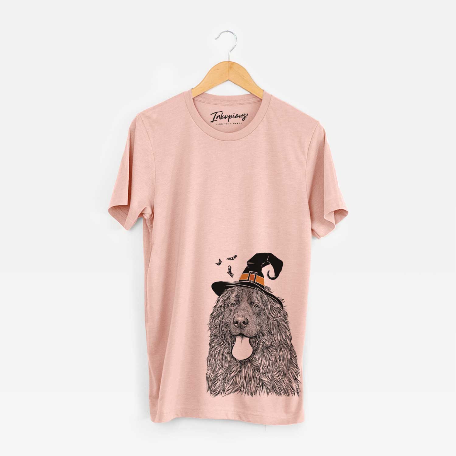 Hand-drawn sketch of Neptune the Newfoundland wearing a witch hat on a Peach Unisex crewneck