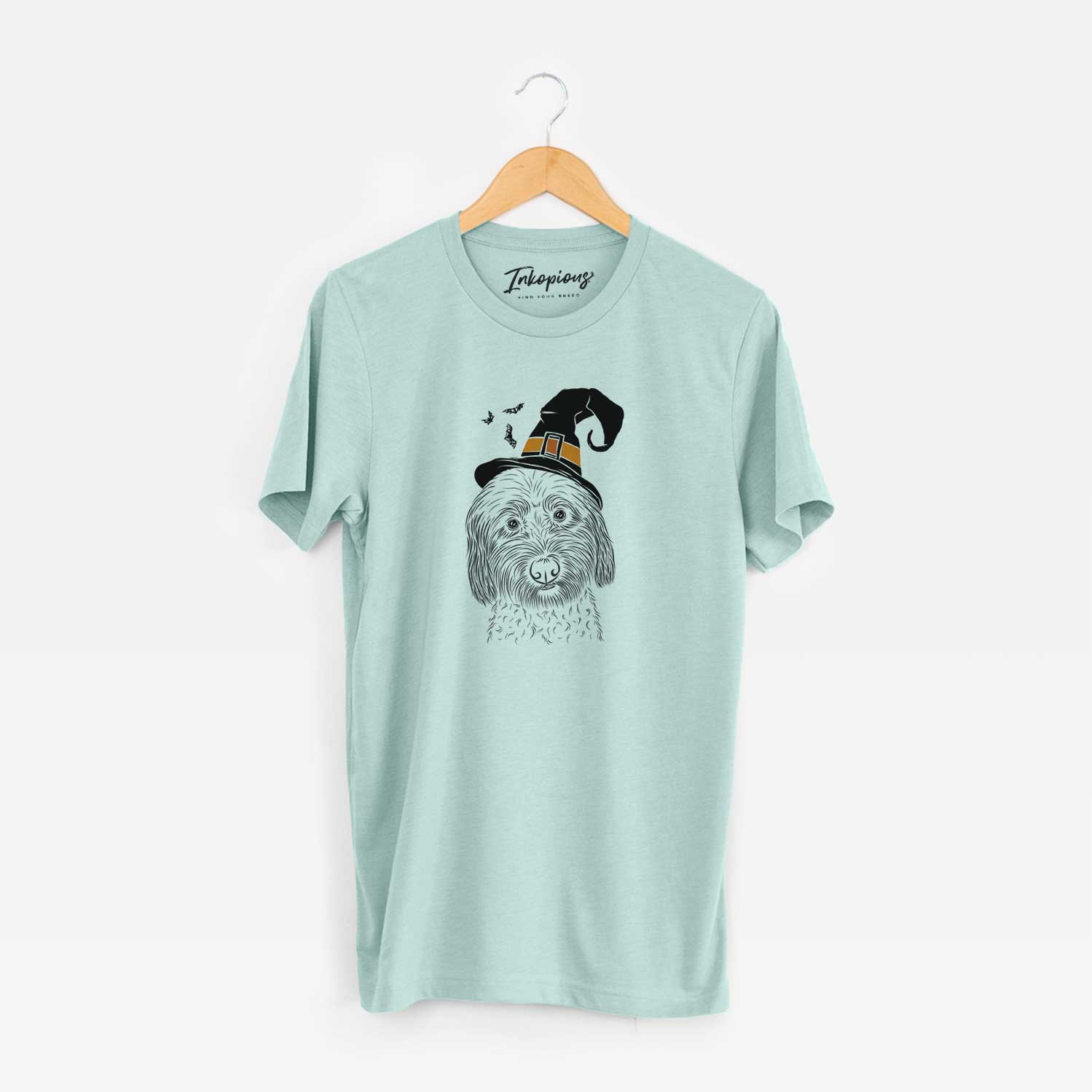 Hand-drawn sketch of Niles the Soft Coated Wheaten Terrier wearing a witch hat on a Heather Sage Unisex crewneck