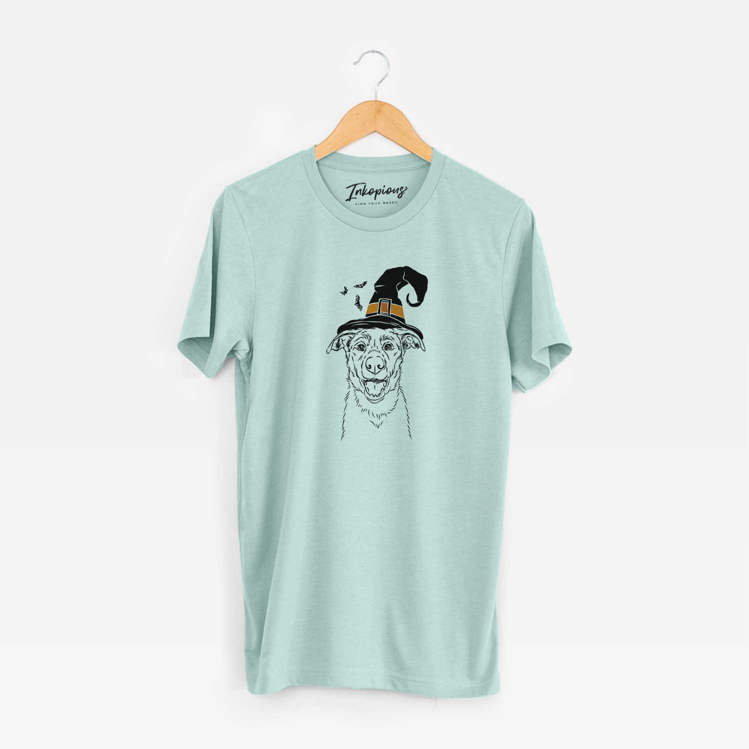 Hand-drawn sketch of Noah the Border Collie wearing a witch hat on a Heather Sage Unisex crewneck