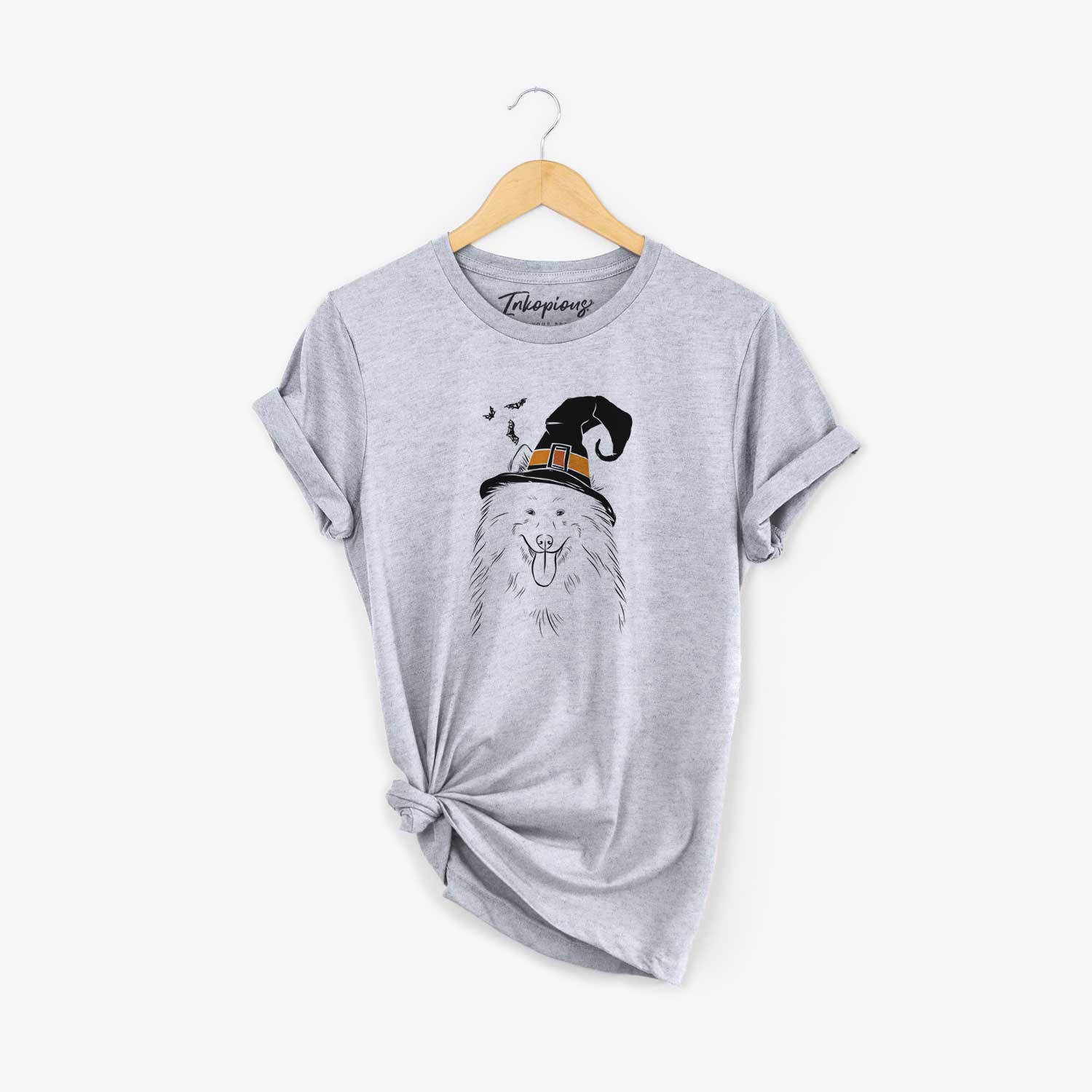 Hand-drawn sketch of Nova the Samoyed wearing a witch hat on a Grey Unisex crewneck