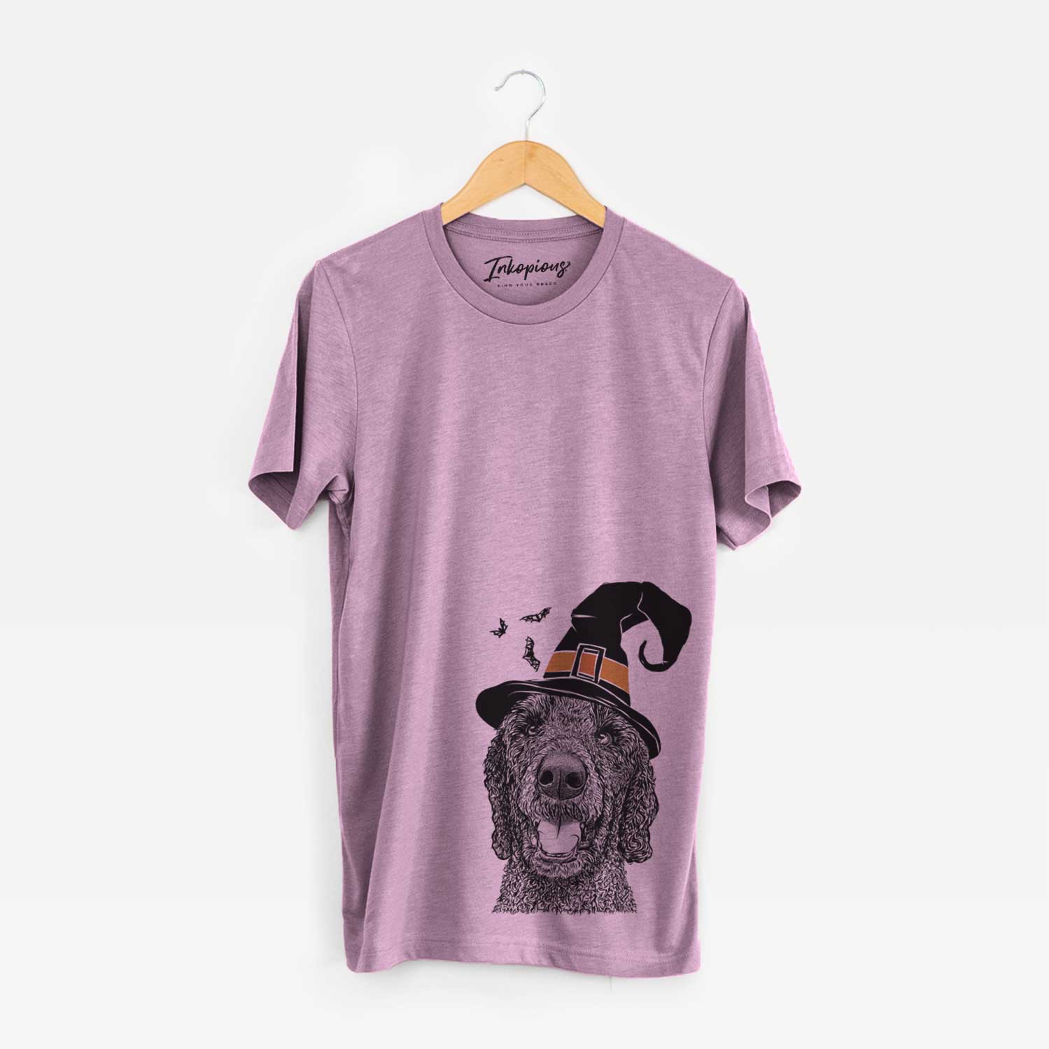 Hand-drawn sketch of Obi James the Goldendoodle wearing a witch hat on an Orchid Unisex crewneck
