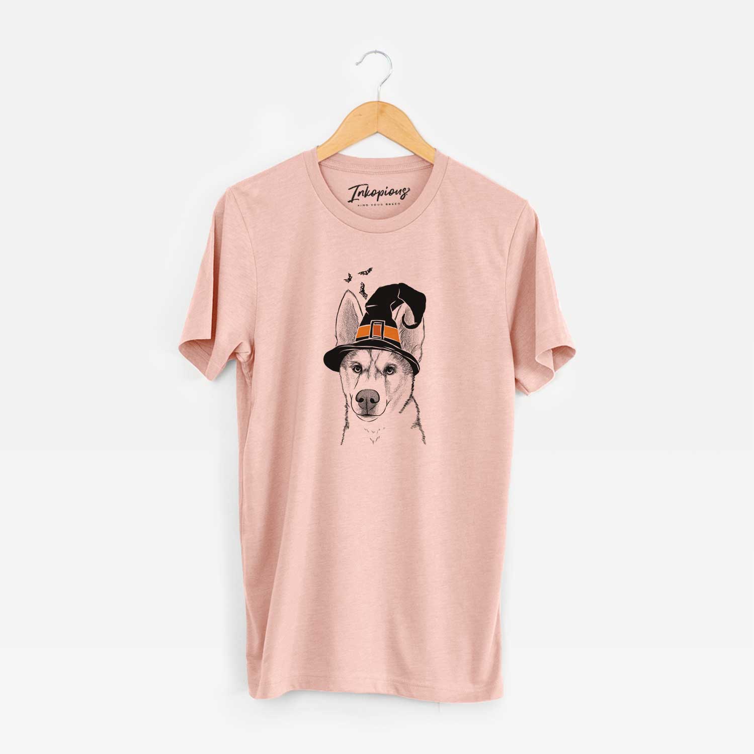 Hand-drawn sketch of Odin the Siberian Husky wearing a witch hat on a Peach Unisex crewneck