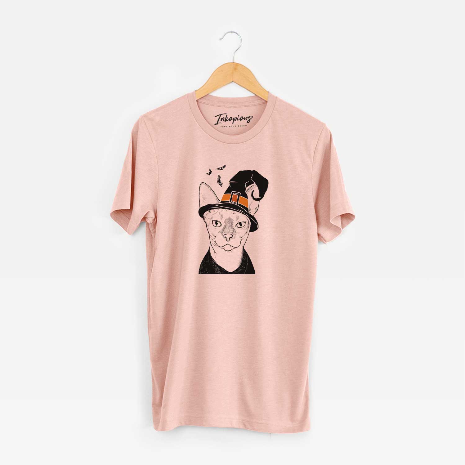 Hand-drawn sketch of Oliver Watson the Sphynx Cat wearing a witch hat on a Peach Unisex crewneck