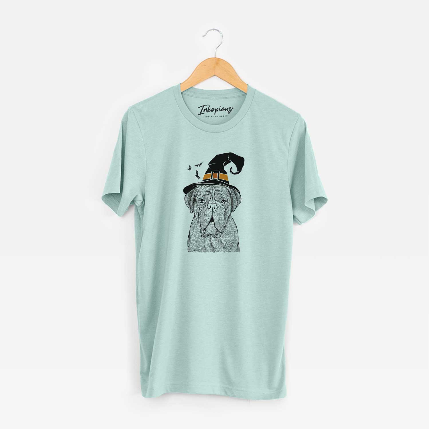 Hand-drawn sketch of Optimus the Dogue de Bordeaux wearing a witch hat on a Heather Sage Unisex crewneck