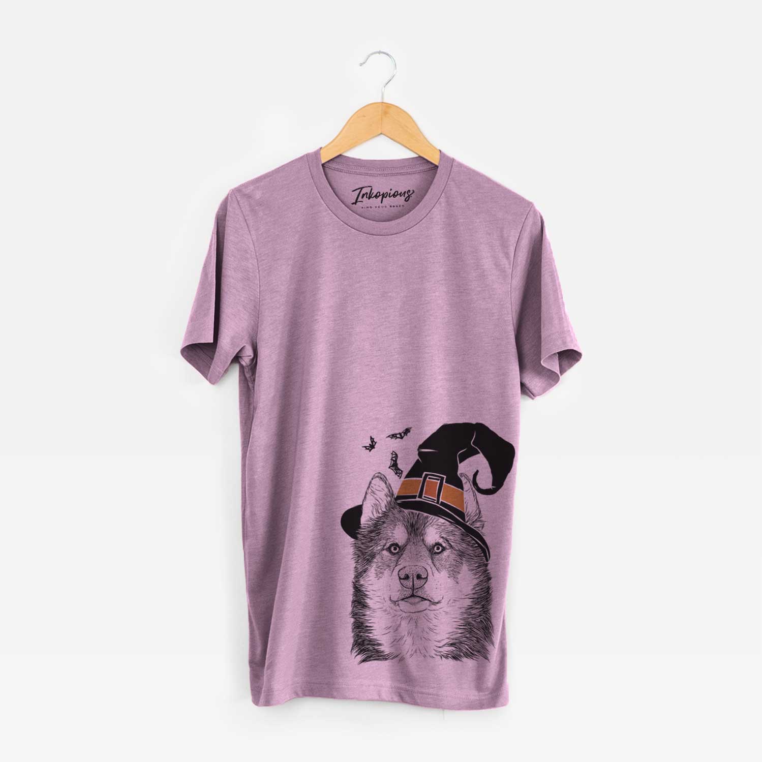 Hand-drawn sketch of Oskar the Canadian Eskimo Dog wearing a witch hat on an Orchid Unisex crewneck