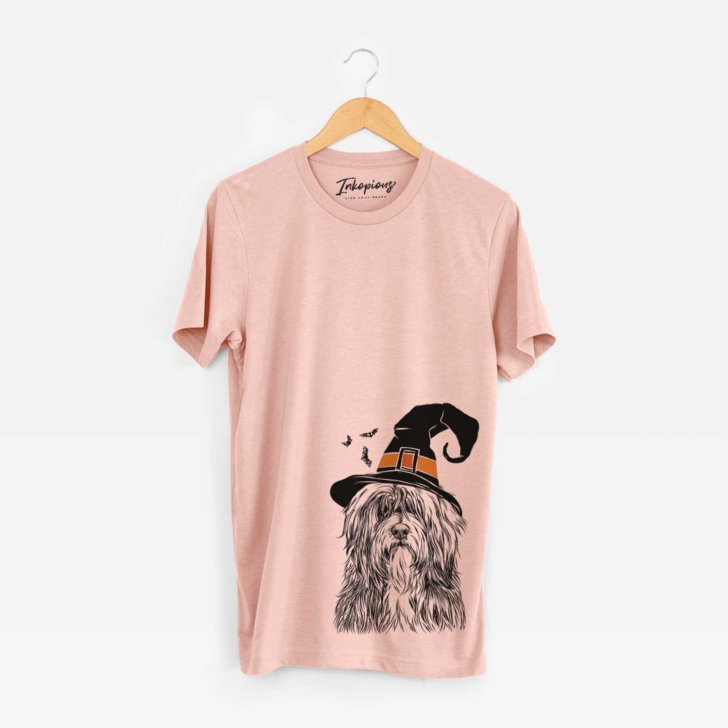 Hand-drawn sketch of Otto the Polish Lowland Sheepdog wearing a witch hat on a Peach Unisex crewneck