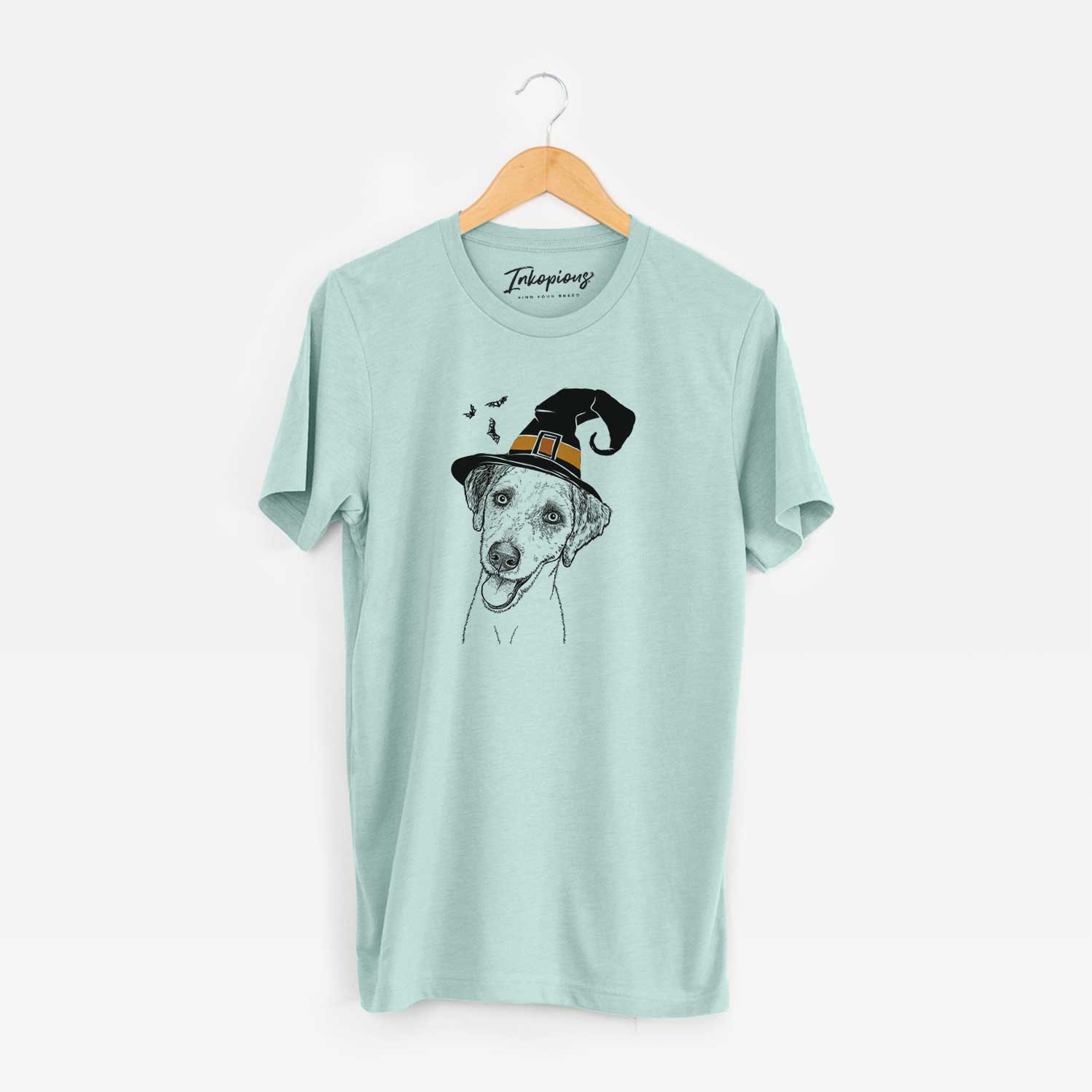 Hand-drawn sketch of Palm Palm the Aussiedoodle wearing a witch hat on a Heather Sage Unisex crewneck
