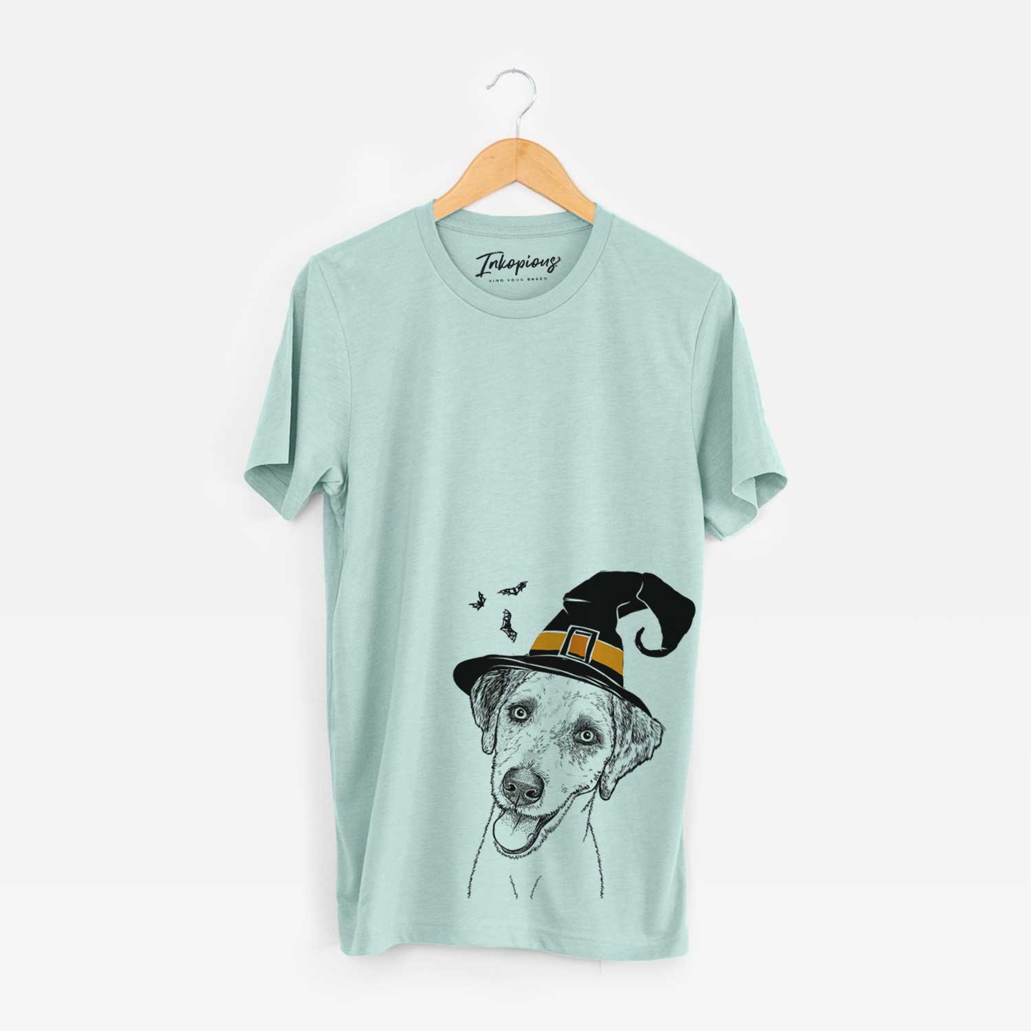 Hand-drawn sketch of Palm Palm the Aussiedoodle wearing a witch hat on a Heather Sage Unisex crewneck